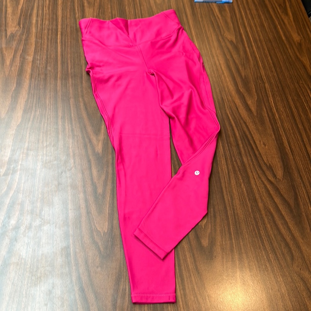 Pink Lululemon workout pants